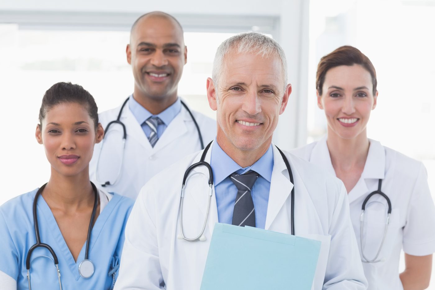Medical team of physicians and clinical staff in a clinic setting — representing the multi-provider practices Ameri-Street Advisory values.